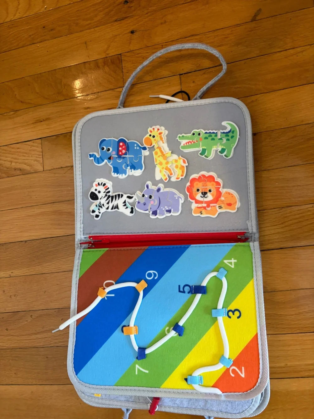 Kids Montessori Busy Board with Colorful Dinosaurs